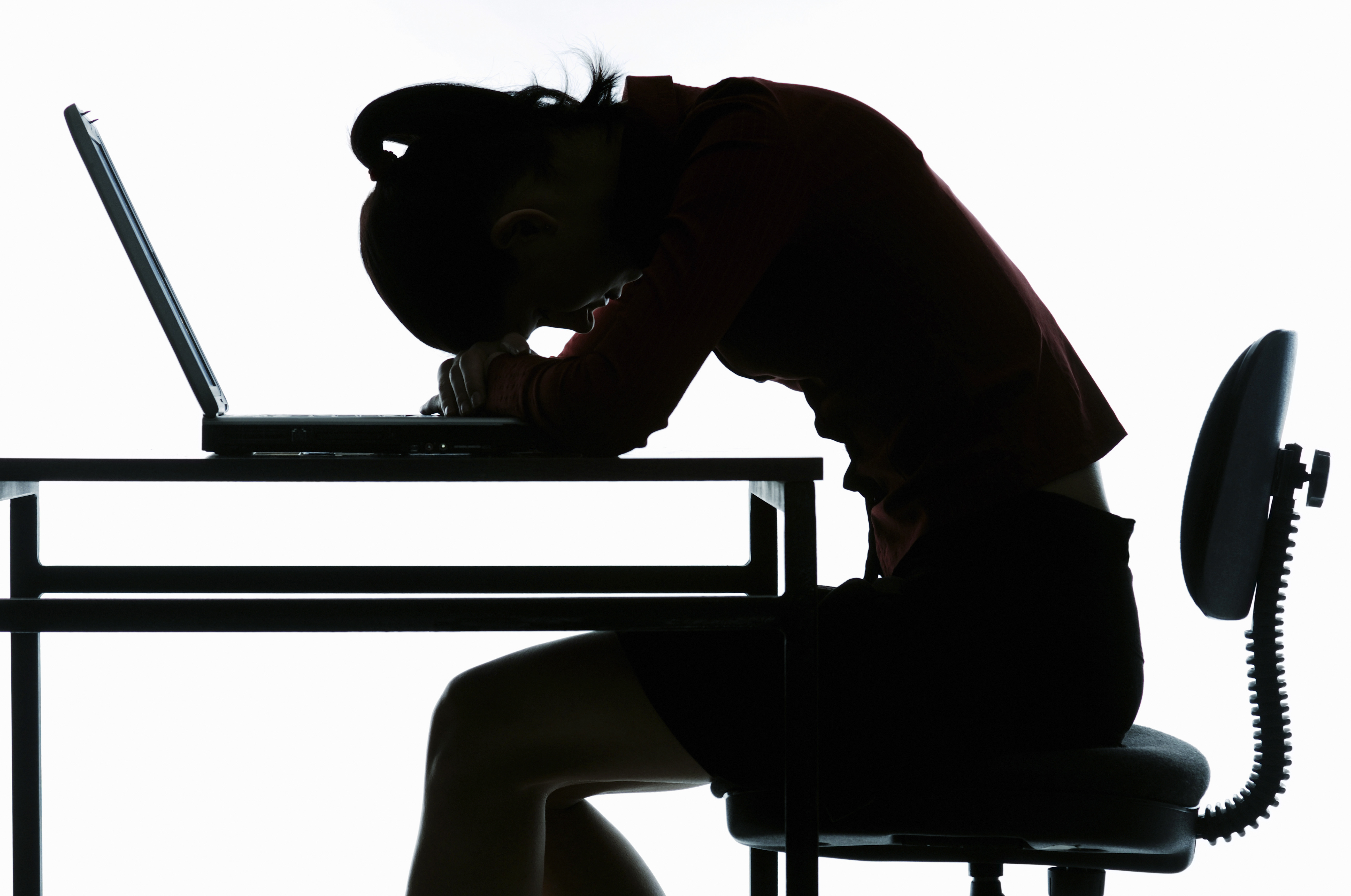 woman asleep at desk